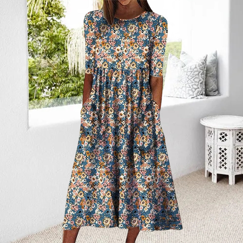 Bedrucktes Kleid mit Taschen und Rundhalsausschnitt
