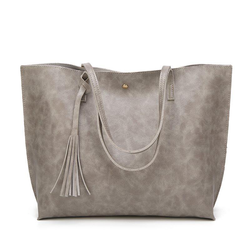 Modische Damen Tasche mit Quasten