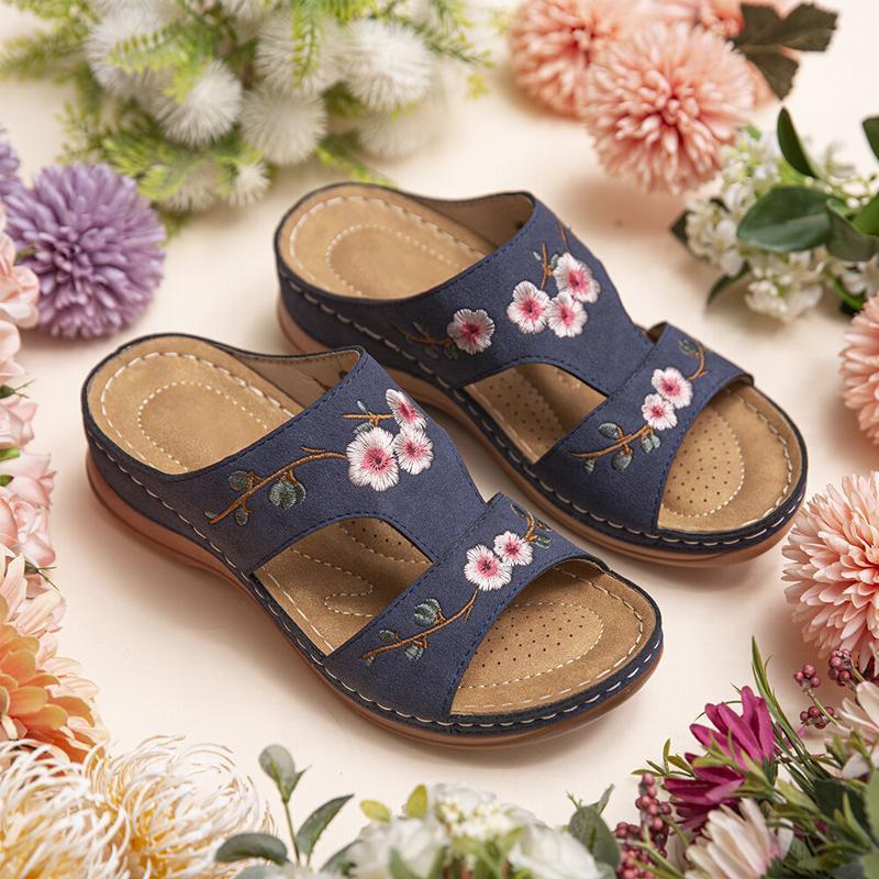 Damen handgemachte lässige hohle Blumensandalen