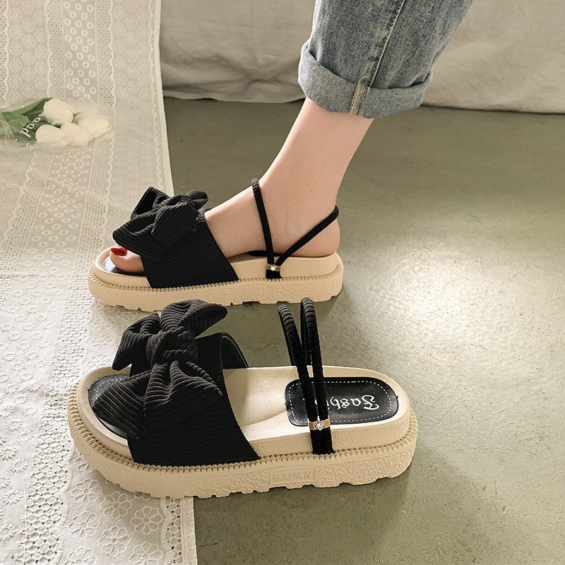 Sommerliche vielseitige modische Sandalen mit Schleife