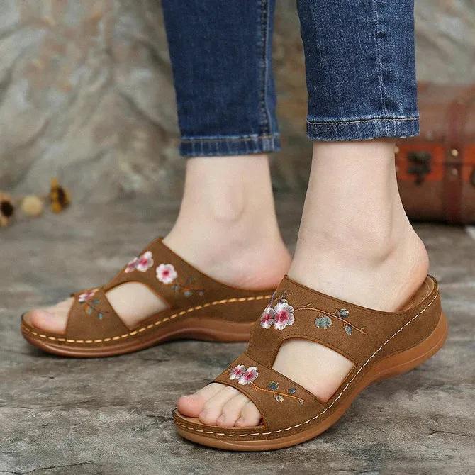 Damen handgemachte lässige hohle Blumensandalen