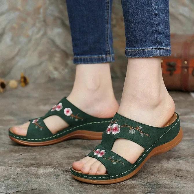 Damen handgemachte lässige hohle Blumensandalen