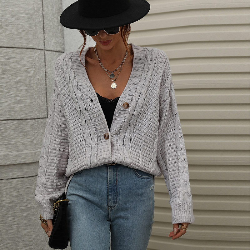 Einfarbige Strickjacke mit Knopf
